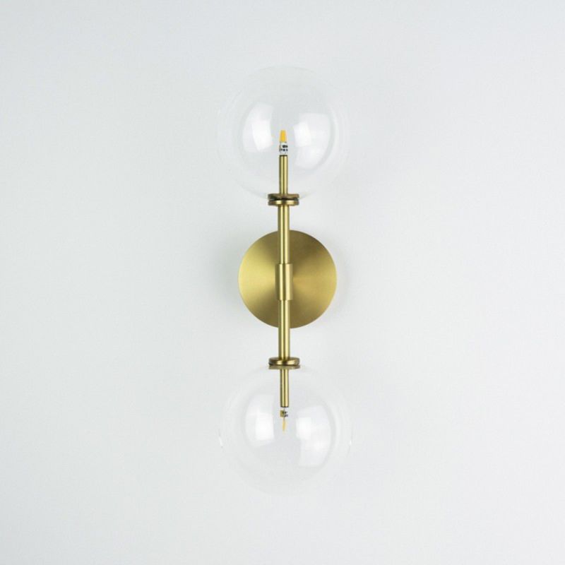 Schwung Dawn Dual Burnished Brass Transparent Globe Wall Light